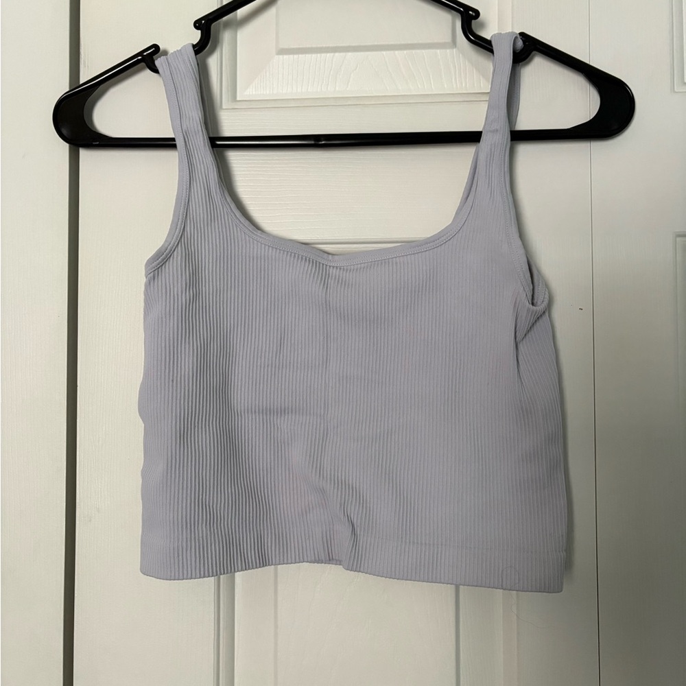 Woman’s simple light grey tank top